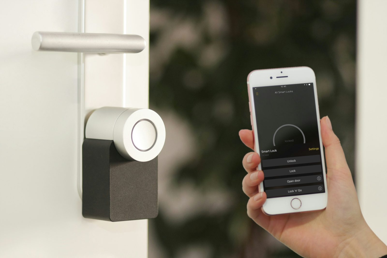 Resident using smartphone for smart access control